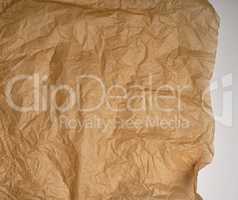 crumpled brown baking parchment paper