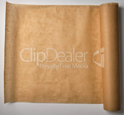 brown parchment baking paper wound into a large roll