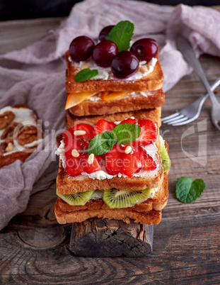 pile of French toast from white bread with cottage cheese, stra