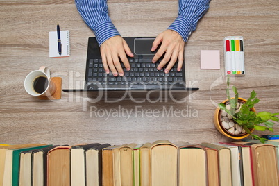 Businessman working on laptop in office