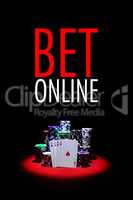 Four Aces with chip stack on red Table with text BET ONLINE