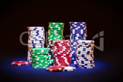Poker chip on black background