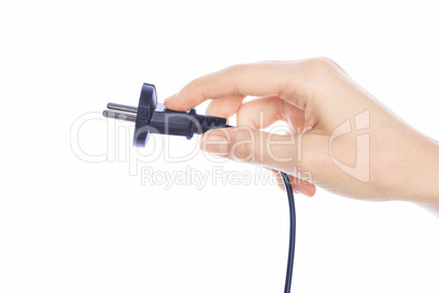 Woman hand holding black male wire plug isolated on white