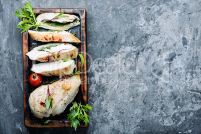Sliced chicken breast with herb