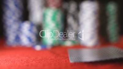 Poker player showing good card combination, pair of aces in slow motion