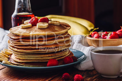 Pancakes with Tea Cup and Fruits.
