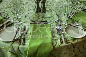 Spring green colored table place setting