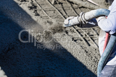 Pool Construction Worker Shooting Concrete, Shotcrete or Gunite