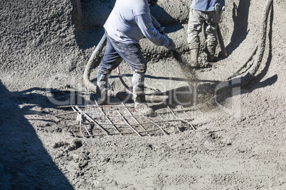 Pool Construction Worker Shooting Concrete, Shotcrete or Gunite