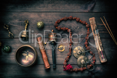 Copper singing bowl, prayer beads, prayer drum and other Tibetan