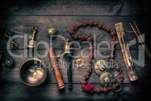 Copper singing bowl, prayer beads, prayer drum and other Tibetan