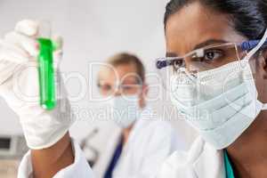 Asian Indian Female Scientist Researcher In Laboratory