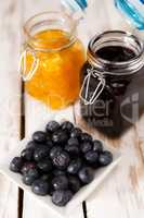 Blueberries over a wooden table