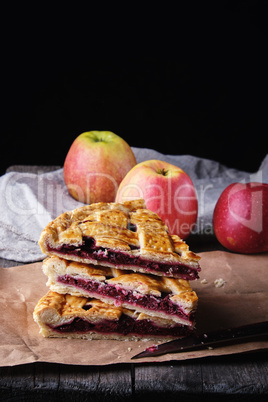 three baked pieces of cake with cherries