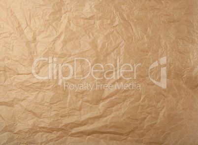 crumpled brown baking parchment paper