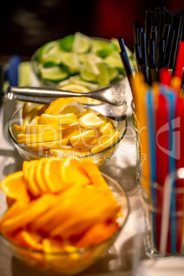 Orange, lemon and lime slices on the wedding table