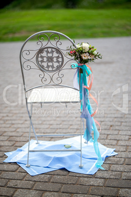 Chair with  flowers and towels