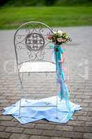 Chair with  flowers and towels