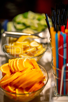 Orange, lemon and lime slices on the wedding table