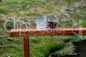 Two glasses of  whiskey in outdoor