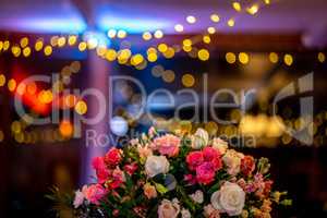 Bridal flowers bouquet on colorful light background