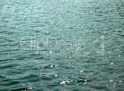 glare on water in city park pond