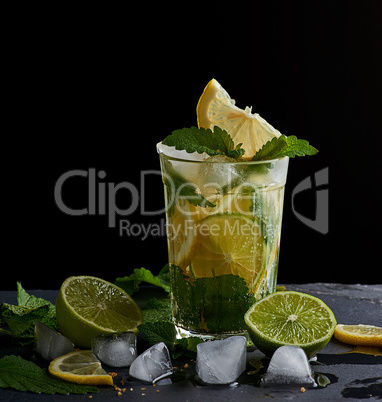 summer refreshing drink lemonade with lemons, mint leaves, ice c