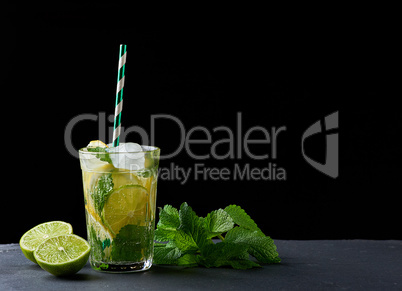 summer refreshing drink lemonade with lemons, mint leaves, ice c
