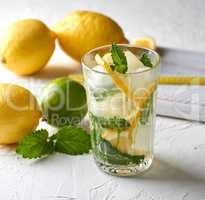 summer refreshing drink lemonade with lemons, mint leaves, lime
