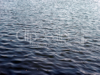 glare on water in city park pond