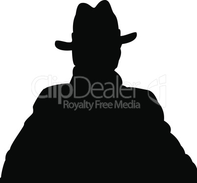 Silhouette of a man in a coat and hat