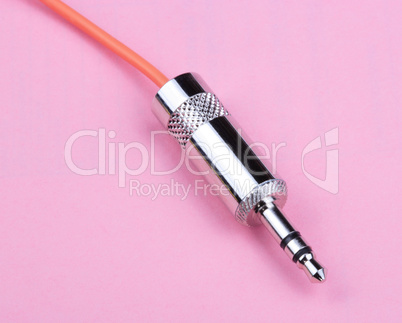 Stereo Male Plug Connector on Pink Background