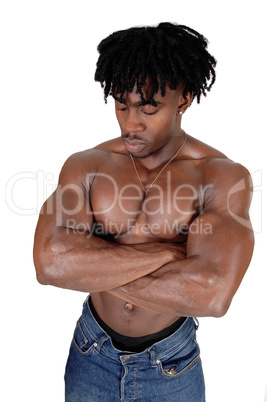 The close up sweaty torso of a black man bodybuilder
