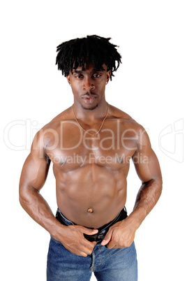 African young man standing shirtless showing his body