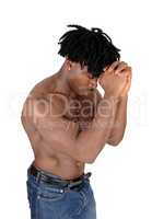 Close up of a black man flexing his muscles with his hands on fa