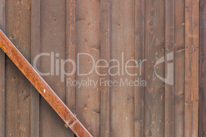 Wooden Wall with Rusty Metal Beam Background