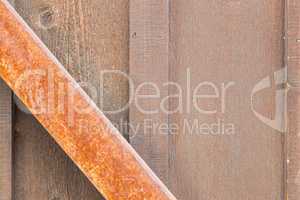 Wooden Wall with Rusty Metal Beam Background