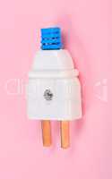 American Outlet Plug on pink background