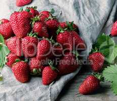 fresh ripe red strawberries on a  wooden table