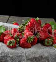 fresh ripe red strawberries on a  wooden table