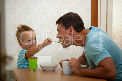 Spoon-feeding of a father