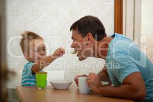 Spoon-feeding of a father