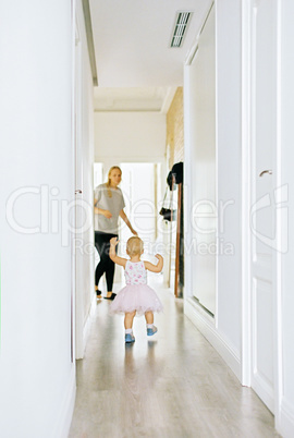 First steps of a little girl