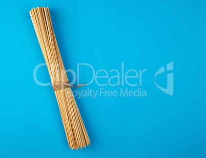 bound stack of wooden bamboo sticks for barbecue