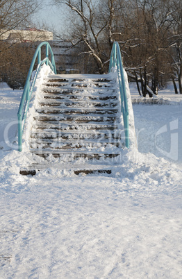 bridge over pond at winter