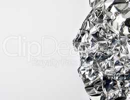 piece of crumpled foil on a white background