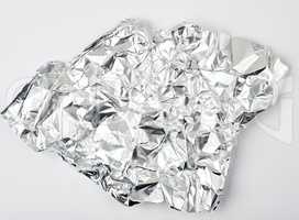 piece of crumpled foil on a white background