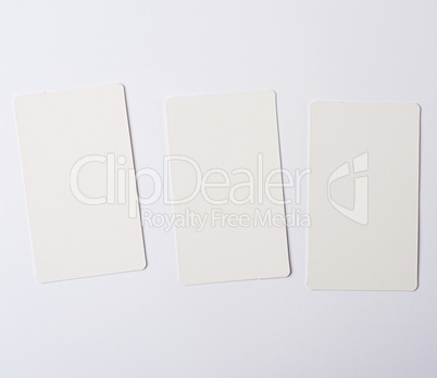 three empty rectangular paper white business business cards