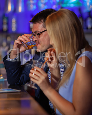 Young people drinking in the bar