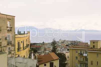 City houses and Gulf of Naples in Italy.